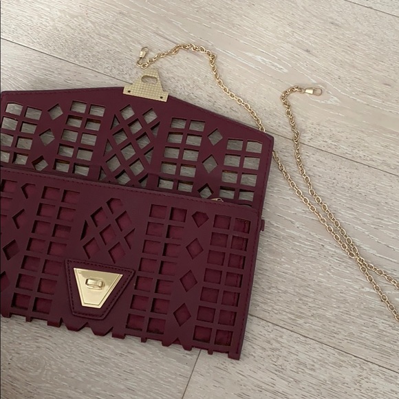 Burgundy clutch and purse with gold details - Picture 2 of 4